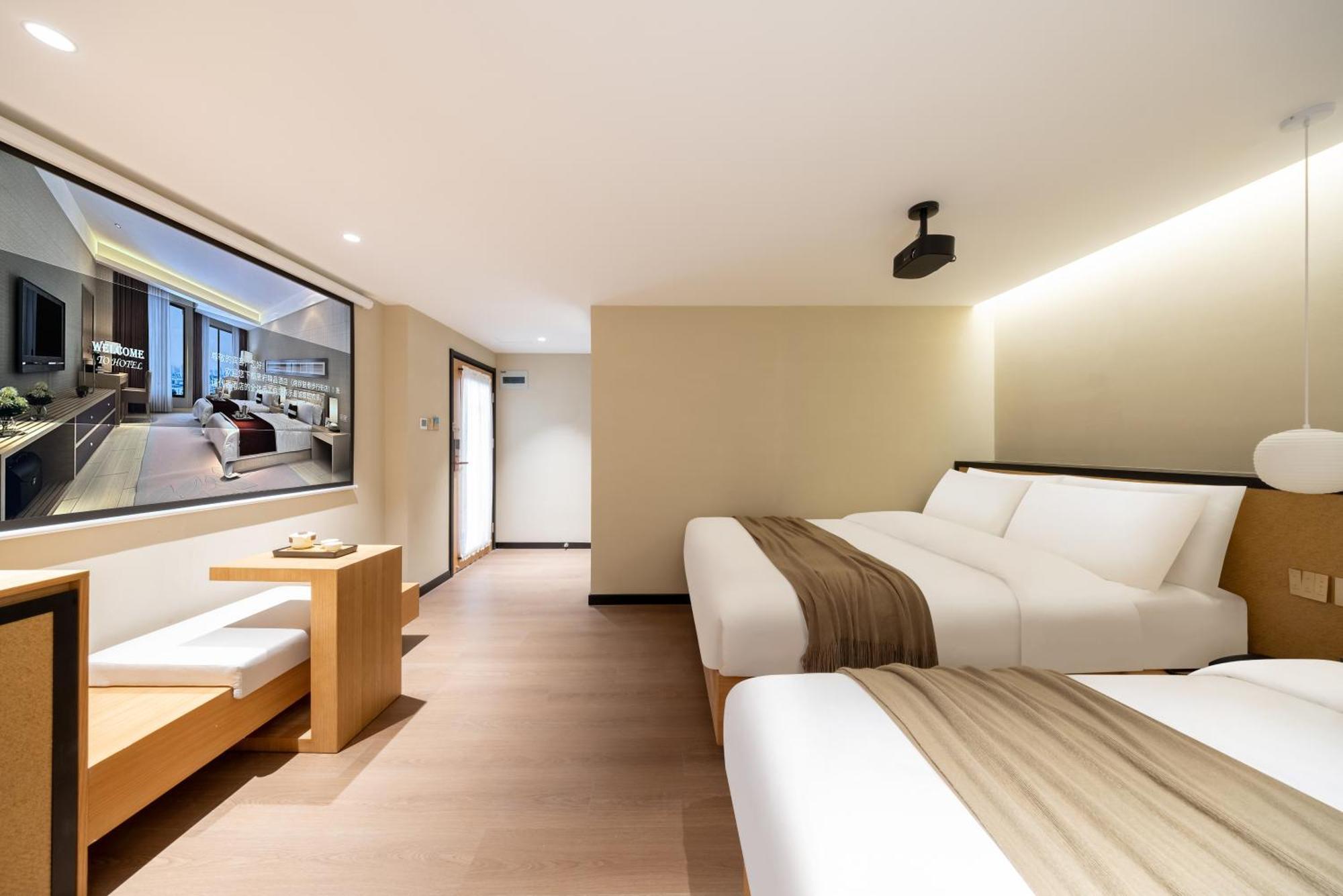 Tangfu Nanluoguxiang Wang Fu Jing Forbidden Snack Street Hotel,1 Stop Walking To Airport Express,3 Stop To Tiananmen&free Laundry Dry Service &professional Free Tour Ticket Service With Speaking Staff Khách sạn Bắc Kinh